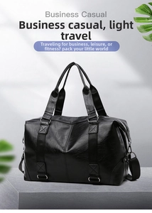 Detailed macro shot of premium black PU leather texture and metal rivets on travel bag
