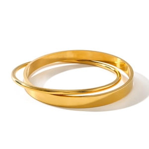 Minimalist minimalist double layer gold bangle set with interlocking flat and round bands