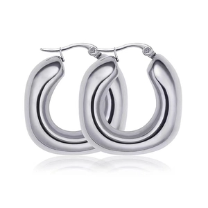 Polished silver stainless steel C-shaped crescent earrings with reflection on white background