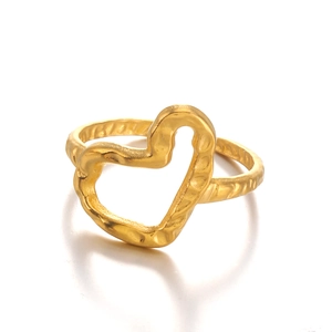Irregular golden heart ring with textured lava finish in minimalist stainless steel