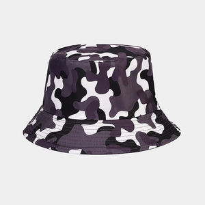 Close-up of camouflage bucket hat in purple and grey with twill fabric texture