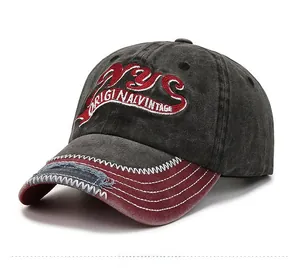 Detail of vintage washed baseball cap with NYC embroidery and distressed brim edge