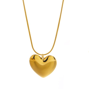 Polished gold heart pendant necklace with sleek snake chain on a clean white background