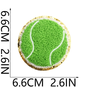 Detail of 6.6cm green chenille tennis ball patch with gold glitter edge and white stitching