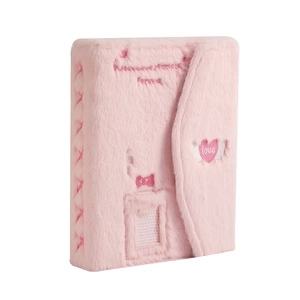 Pink plush A5 photocard binder with embroidered heart wings and a transparent pocket