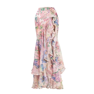 Detail of pink floral swimsuit with ruffle mesh layers and elegant fish tail skirt design