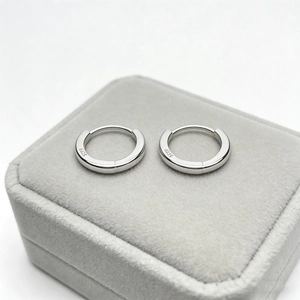 Polished S925 sterling silver hoop earrings with clear S925 hallmark on jewelry tray