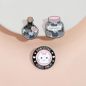 Set of cute cartoon cat enamel pins including happiness potion and metal badges