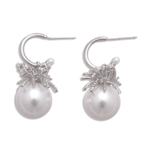 Elegant C-shaped earrings with white pearls and S925 silver needles on white background