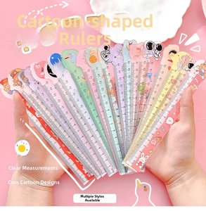 Detail view of colorful 15cm cartoon acrylic rulers with astronaut and animal designs
