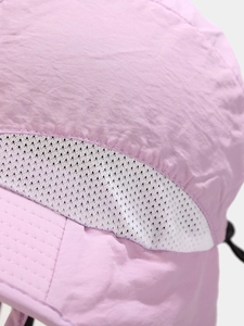 Detail of lavender sun hat showing breathable white mesh panel and fine stitching