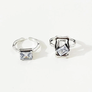 Minimalist 925 sterling silver rings with rectangular zircon stones on white background
