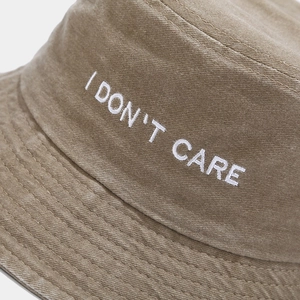 Khaki washed cotton bucket hat with white embroidery and reinforced brim stitching