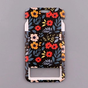 Close-up of sliding card holder with spring floral pattern on a sleek black background