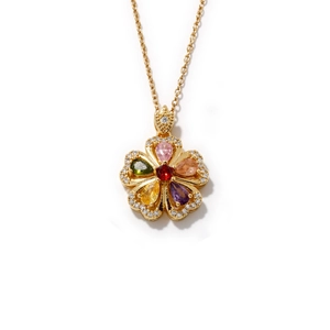 Elegant gold flower necklace with colorful gemstones and sparkling white zircons