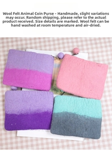 Macro view of handmade wool felt coin purses with zipper detail and soft matte texture