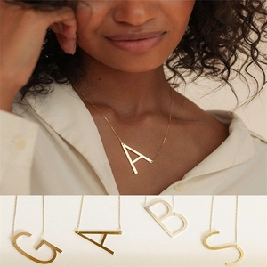 Golden stainless steel A-Z initial necklaces set with large letter pendants for women