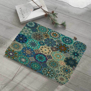 Detail of bohemian mandala square flannel floor mat on light grey wooden floor decor