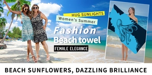 Detail showing high-quality bright blue beach towel with detailed octopus print patterns