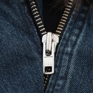 Vintage blue cropped denim jacket with premium metal YKK zipper and texture detail