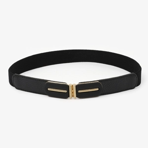 Women's vintage cinch belt with black elastic band and golden engraved metal buckle