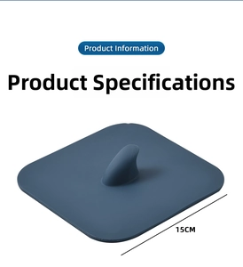 Detail view of the 15cm square navy blue silicone floor drain cover with fin handle