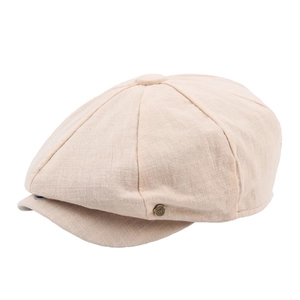 Classic beige newsboy cap with cotton linen texture and metal W emblem on plain background