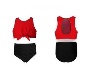 Flat lay of red bikini top with bow and black high-waisted bottoms from both sides