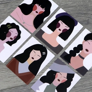 Detail of artistic goddess illustration jewelry display cards on wooden background