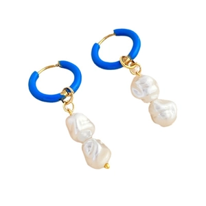Elegant gold earrings with blue enamel hoops and white baroque pearls on white backdrop