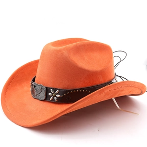 Detail of orange suede cowboy hat featuring eagle metal buckle and floral silver rivets