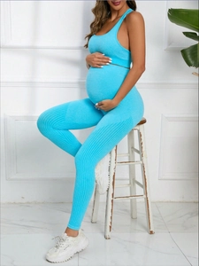 Detail of light blue maternity yoga set with high elastic knit fabric and breathable holes