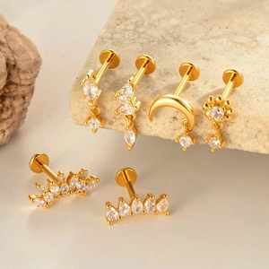 Set of 6 gold titanium star and moon labret earrings with sparkling zircon stones