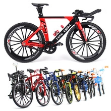 Detailed macro view of collectible alloy time trial bike models in multiple colors