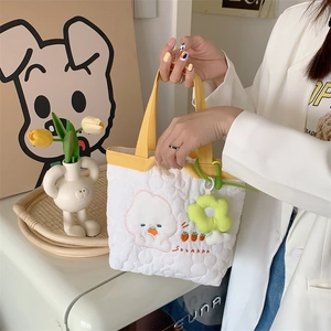 Quilted white floral handbag with yellow handles and cute pet embroidery detail