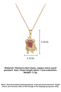 Detail view of butterfly necklace with pink zircon and pearl on gold titanium steel chain