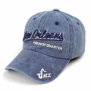 Detail of New Orleans jazz embroidery on a vintage washed navy baseball cap