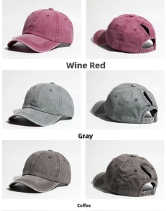 Detail view of washed cotton ponytail baseball caps in burgundy, grey, and brown colors