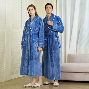 Classic blue flannel bathrobes for couples featuring a long design and white trim detailing