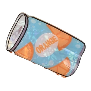 Macro shot of blue orange juice can hair claw clip with glossy plastic finish