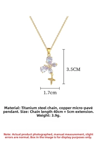 Macro view of crystal butterfly pendant with sparkling cubic zirconia on gold chain