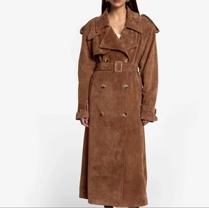 Detail of long brown suede coat with double-breasted buttons and matching belt buckle