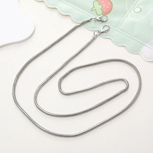 Detailed view of silver metal snake chain with dual lobster clasps for bags or phone cases