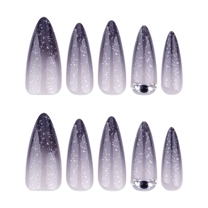 Y2K dark ombre almond press-on nails with glitter and rhinestones on white background