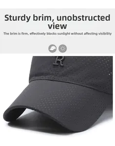 Macro detail of breathable mesh fabric and R letter embroidery on black baseball cap