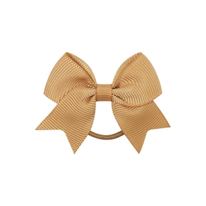 Close-up of champagne gold grosgrain ribbon bow with swallowtail and elastic hair tie