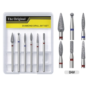 Macro shot of 6-piece diamond nail drill bit set in storage case for professional manicure
