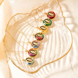 Virgin Mary crystal pendant necklace on a shell tray with golden chain for women
