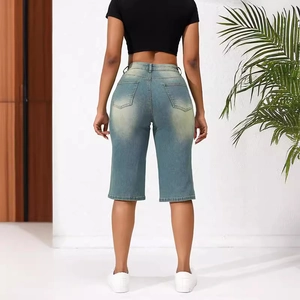 Women's blue washed denim bermuda shorts with a high-waisted straight fit and back view