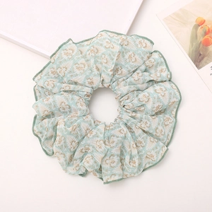 Floral oversized scrunchie in light green chiffon with sweet vintage flower print